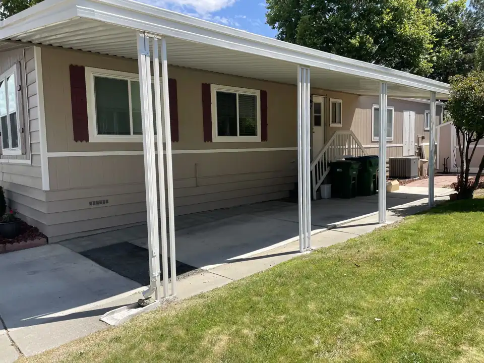 Before: Carport awning, sun-shade screen wall