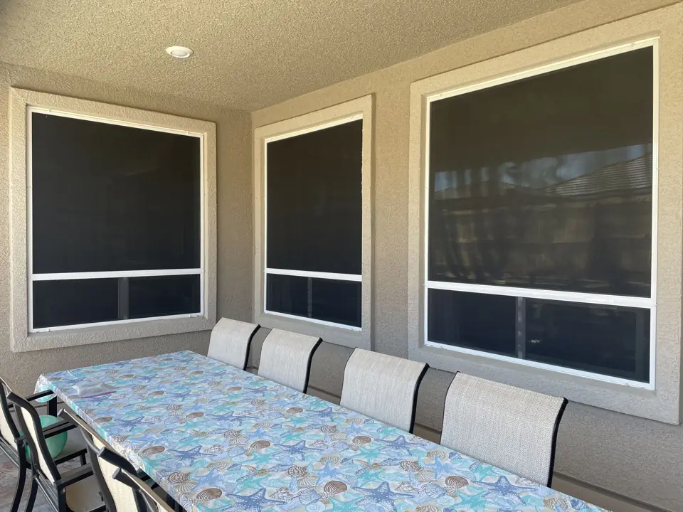 After: solar screens on three patio windows