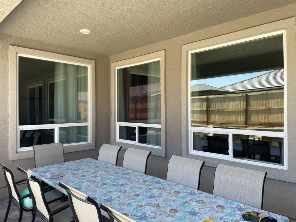 Before: Patio windows, solar screens